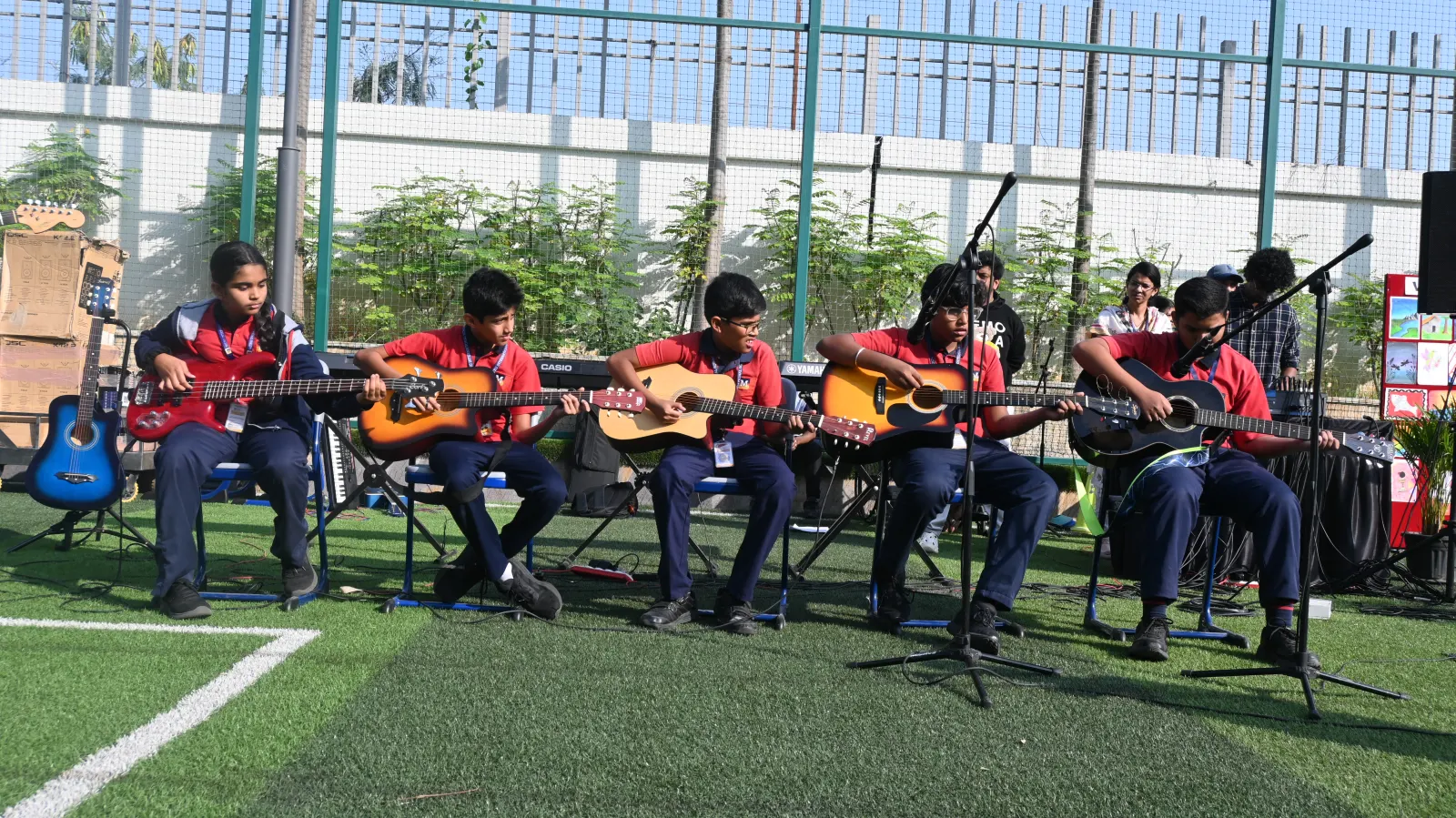 Students in a Meru creative arts stage performance