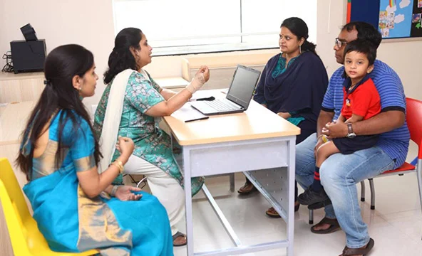 Parents interacting with teachers