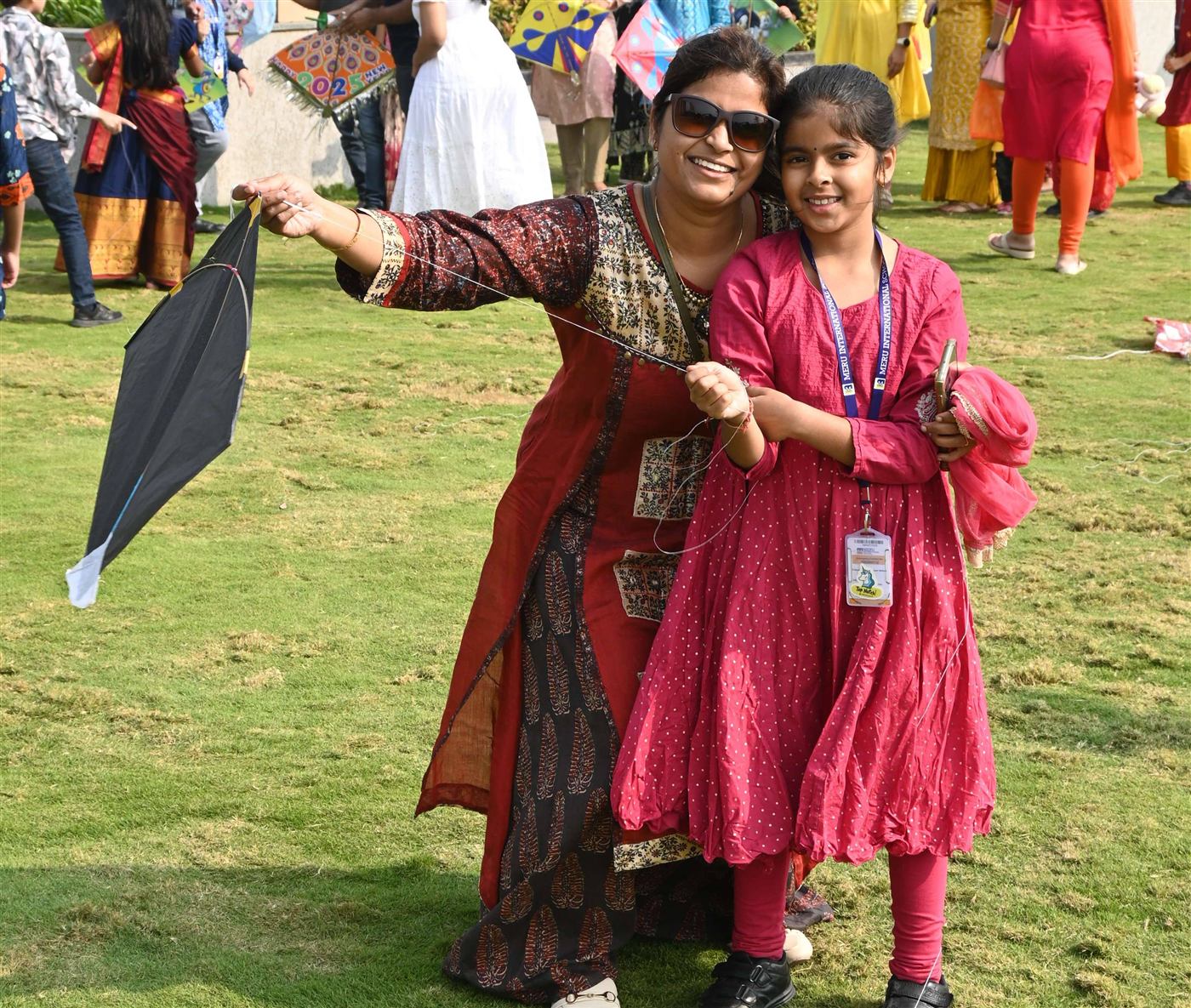 Parents and students kite flying at Sankranti