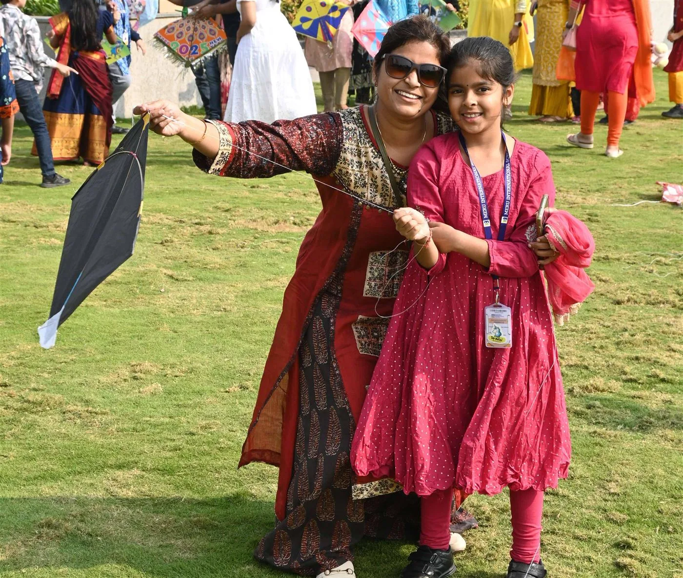 Parents and students kite flying at Sankranti