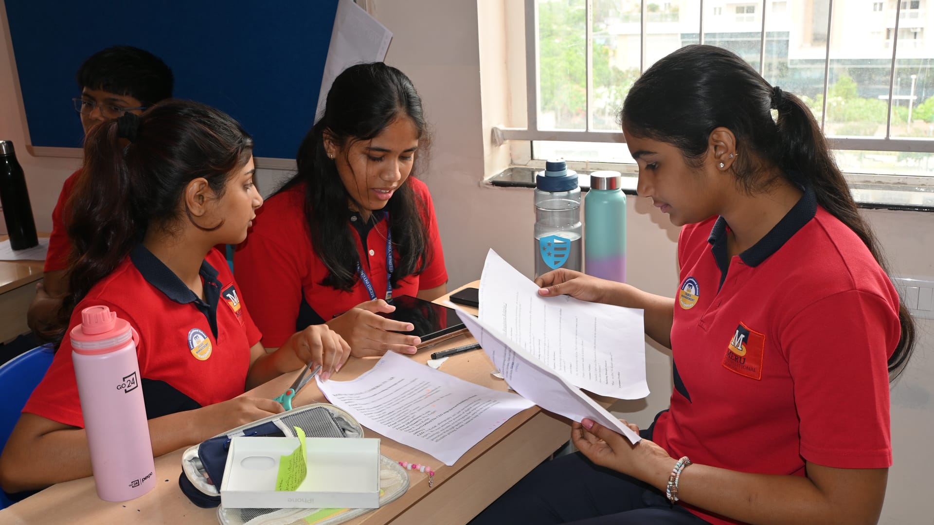 A teacher using assessment insights to support students